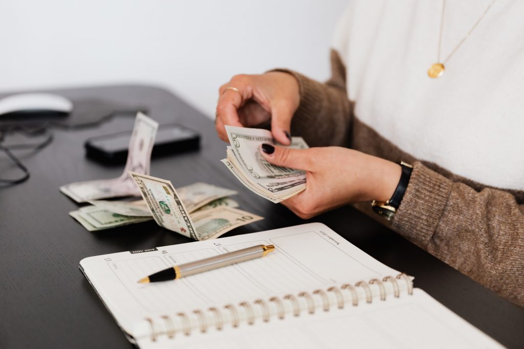 woman counting cash